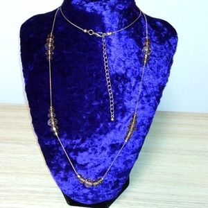 Smokey sattalite beads on goldtone chain and lobster clasp